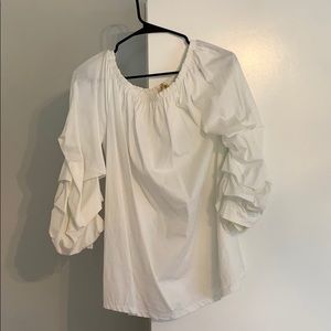 White puffy arm shirt